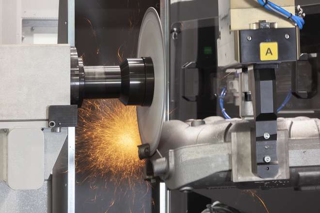 Cutting disc of a MEPSA robotic cell cutting excess material from a cast part