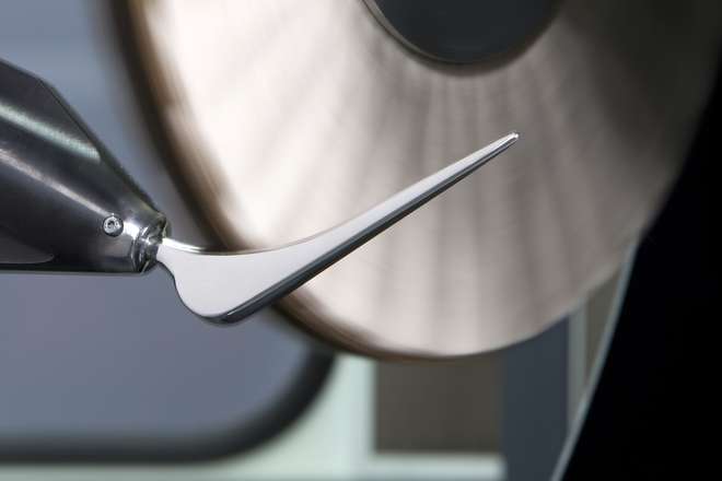 Polishing disc of a MEPSA robotic cell polishing a hip prosthesis